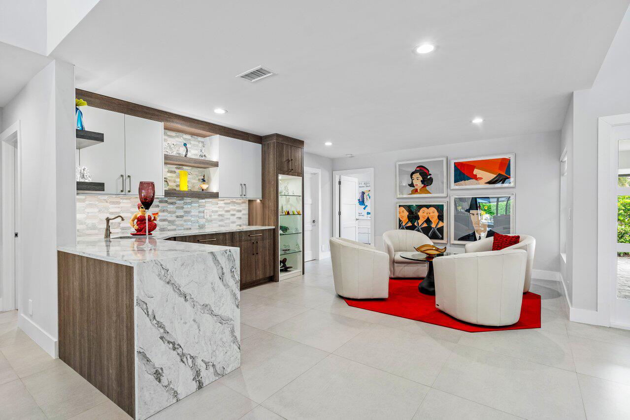 3707 Red Maple Circle Delray Beach, FL 33445 - Photo 8 of 39 a living room with furniture and a flat screen tv