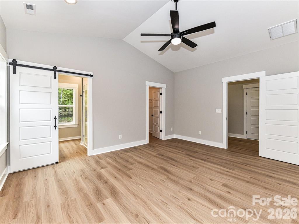 6720 Jesse Rushing Road Marshville, NC 28103 - Photo 14 of 28 wooden floor in an empty room with a window