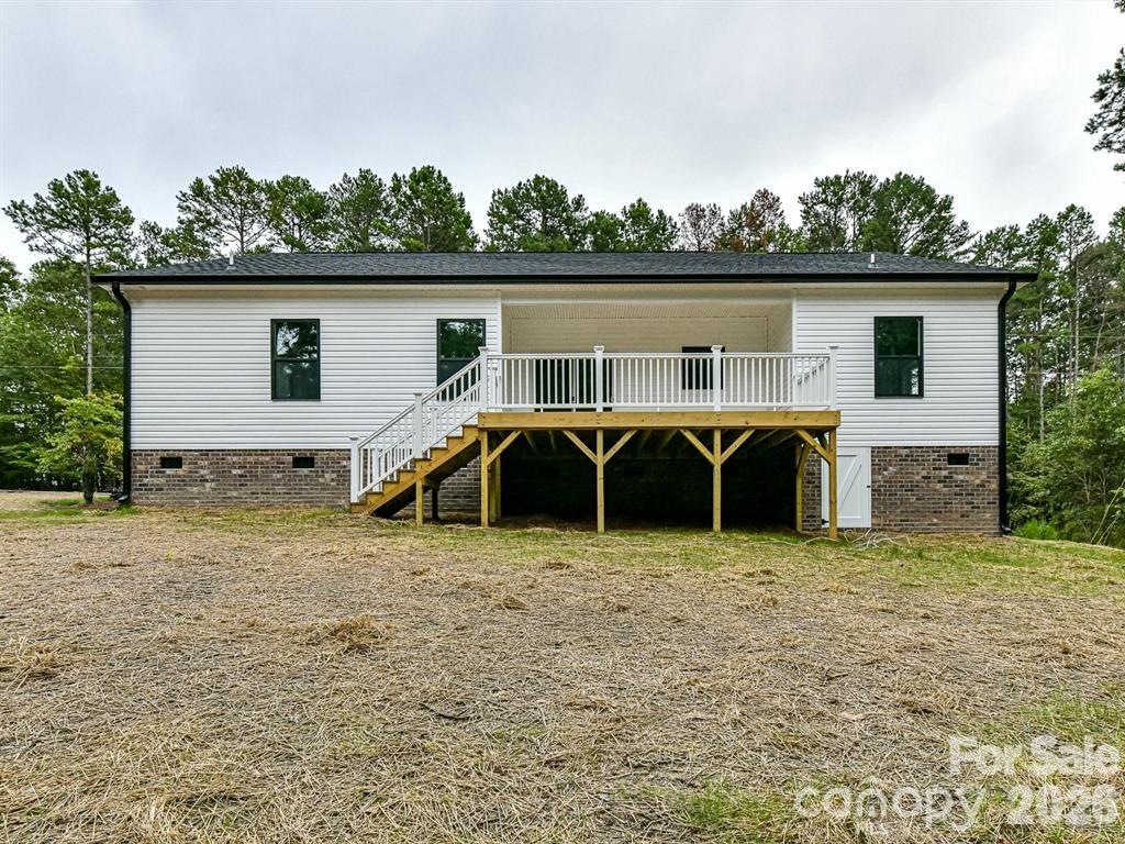 6720 Jesse Rushing Road Marshville, NC 28103 - Photo 26 of 28 a view of a house with yard