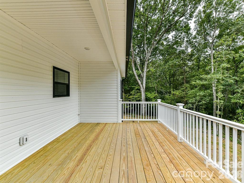 6720 Jesse Rushing Road Marshville, NC 28103 - Photo 28 of 28 a view of balcony with wooden floor