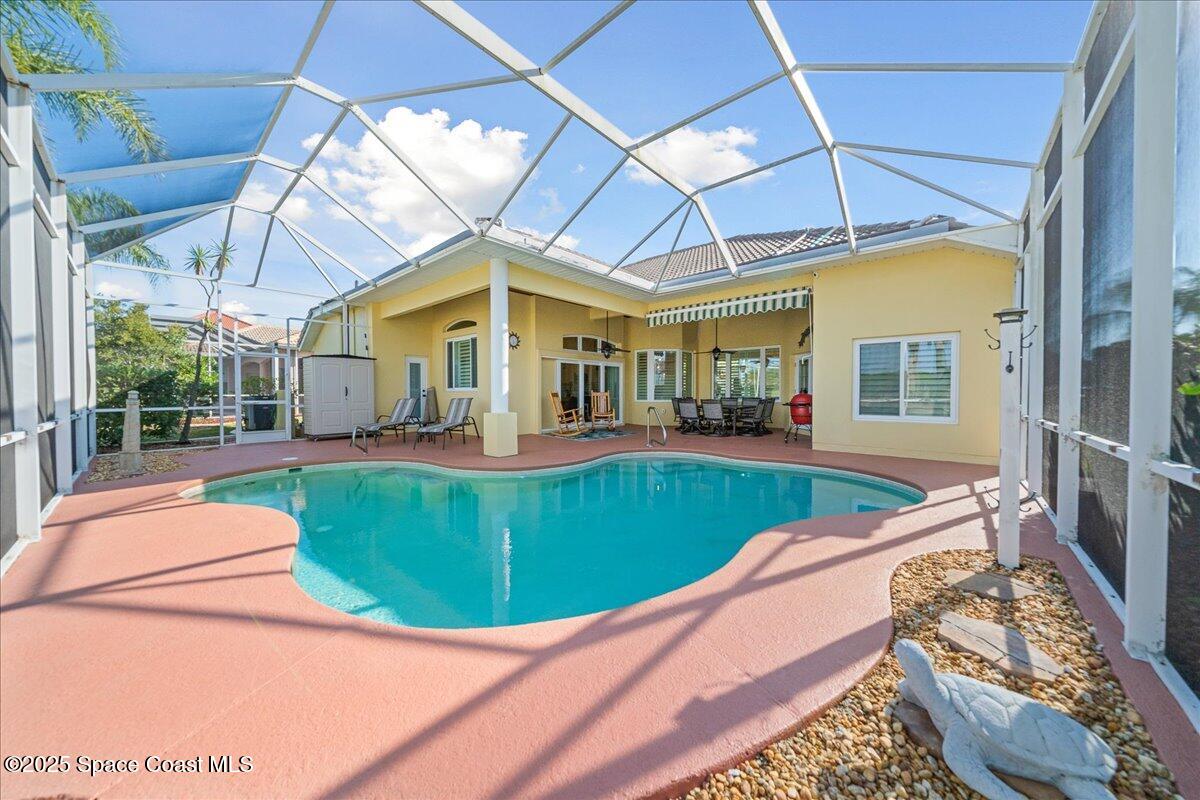 4329 Collingtree Drive Rockledge, FL 32955 - Photo 25 of 36 a view of a house with a swimming pool