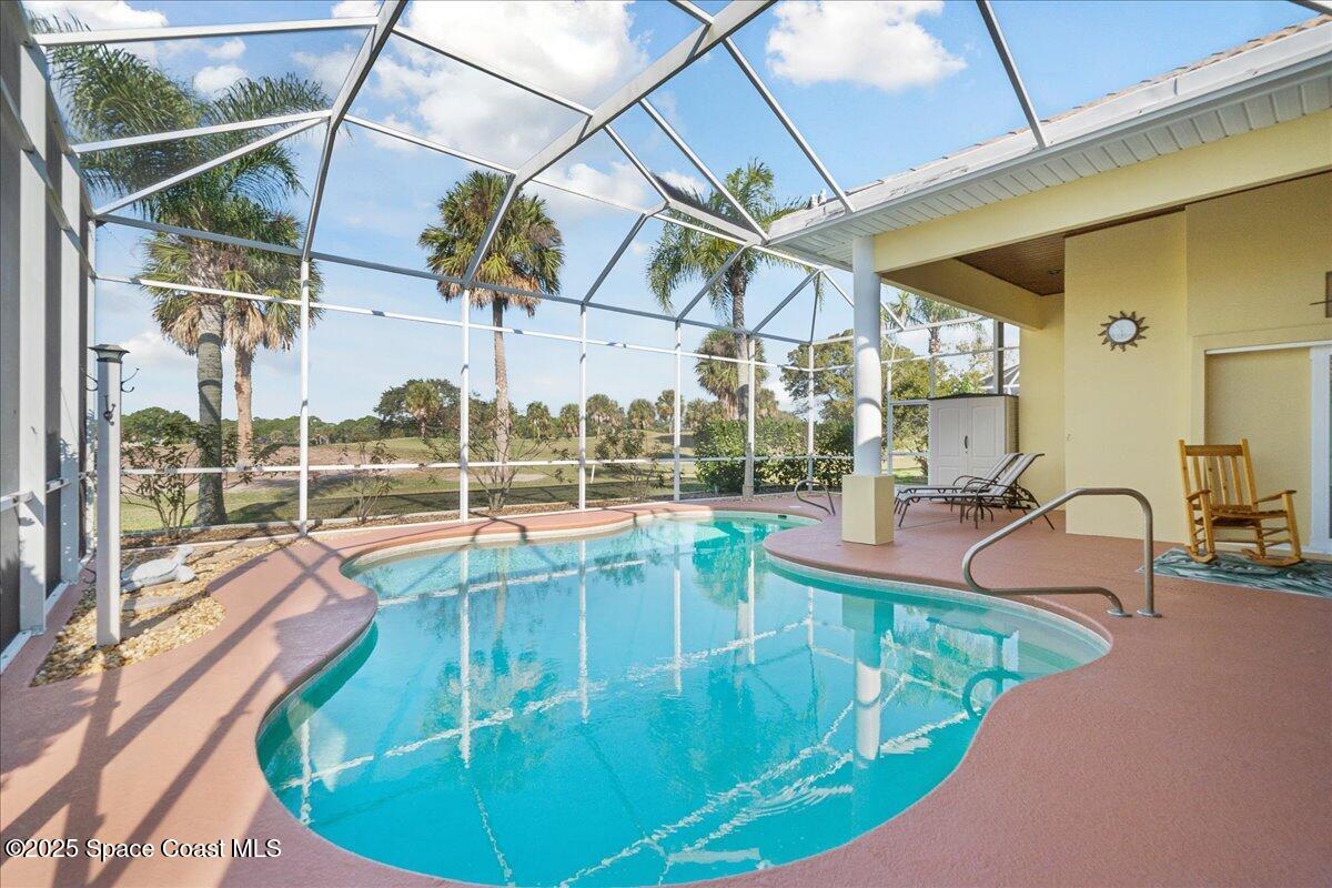 4329 Collingtree Drive Rockledge, FL 32955 - Photo 26 of 36 a view of a swimming pool with a patio