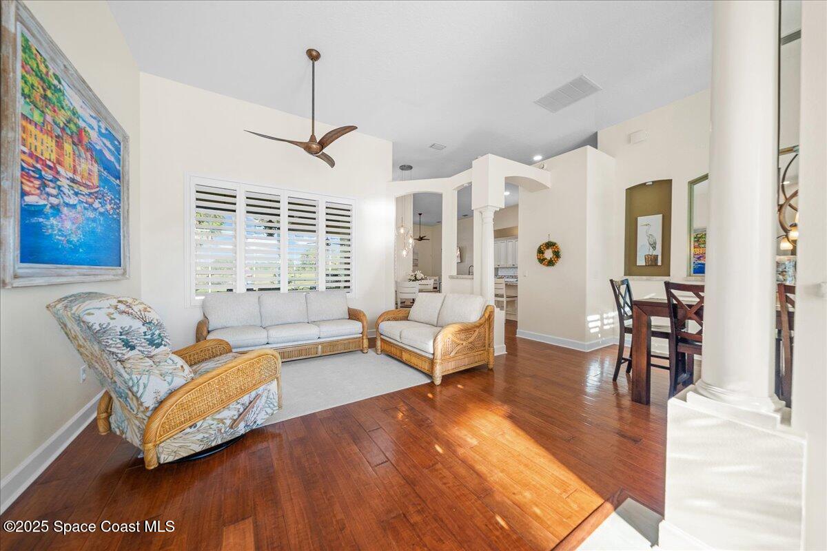 4329 Collingtree Drive Rockledge, FL 32955 - Photo 5 of 36 a living room with furniture wooden floor and a table
