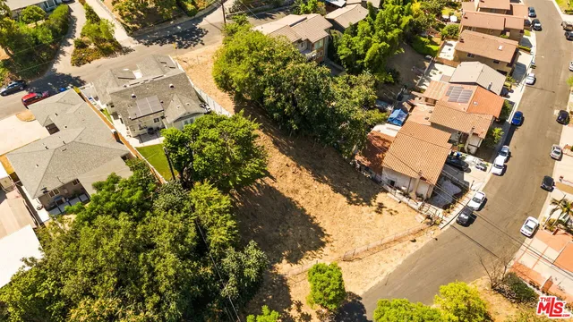 an aerial view of residential house with outdoor space