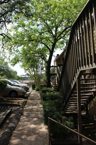 a view of a backyard with a small cabin