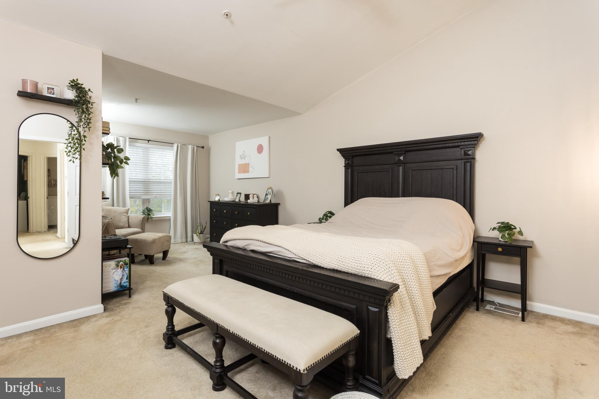 3013 Raking Leaf Drive Abingdon, MD 21009 - Photo 12 of 29 a bedroom with a bed a mirror and lamp
