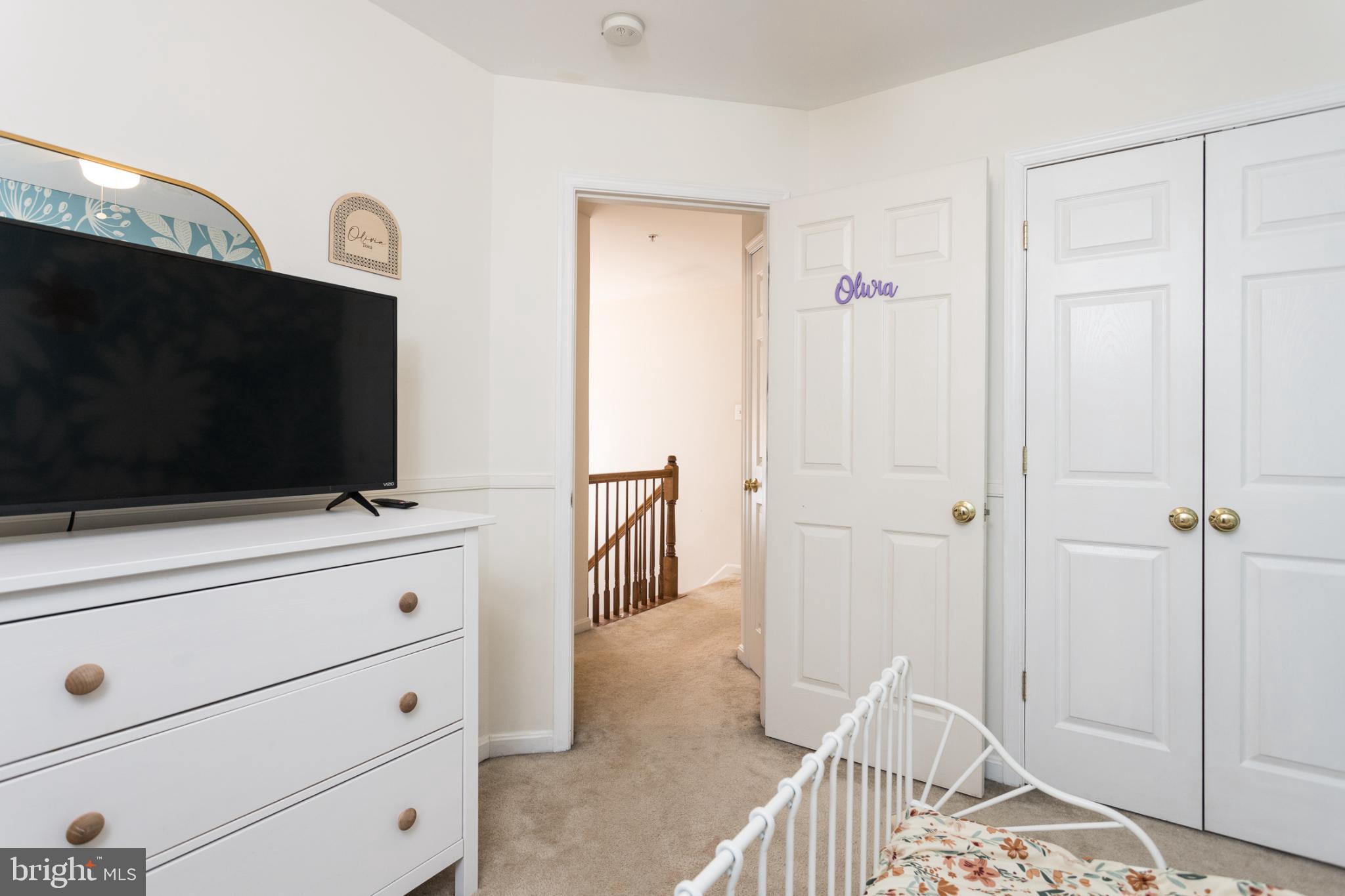 3013 Raking Leaf Drive Abingdon, MD 21009 - Photo 20 of 29 a bedroom with a bed and a flat screen tv