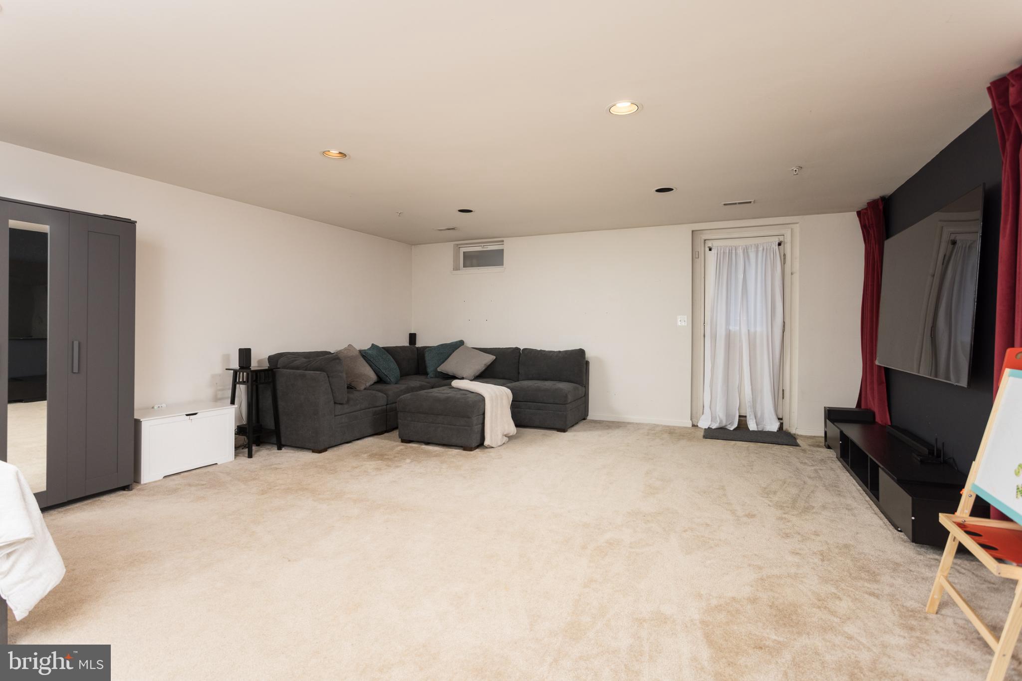3013 Raking Leaf Drive Abingdon, MD 21009 - Photo 22 of 29 a large bedroom with a bed and a television in it