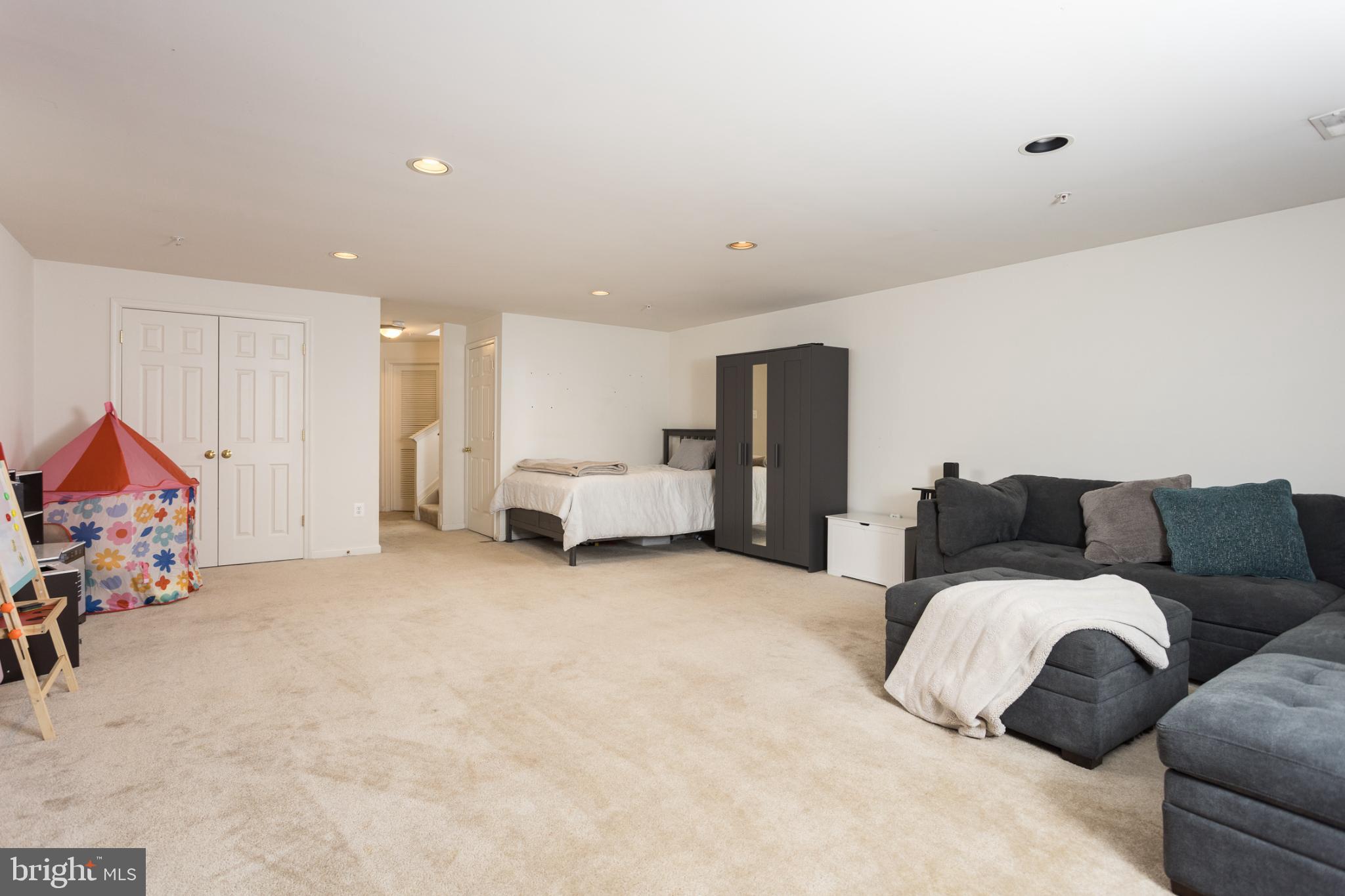3013 Raking Leaf Drive Abingdon, MD 21009 - Photo 23 of 29 a living room with furniture and a flat screen tv