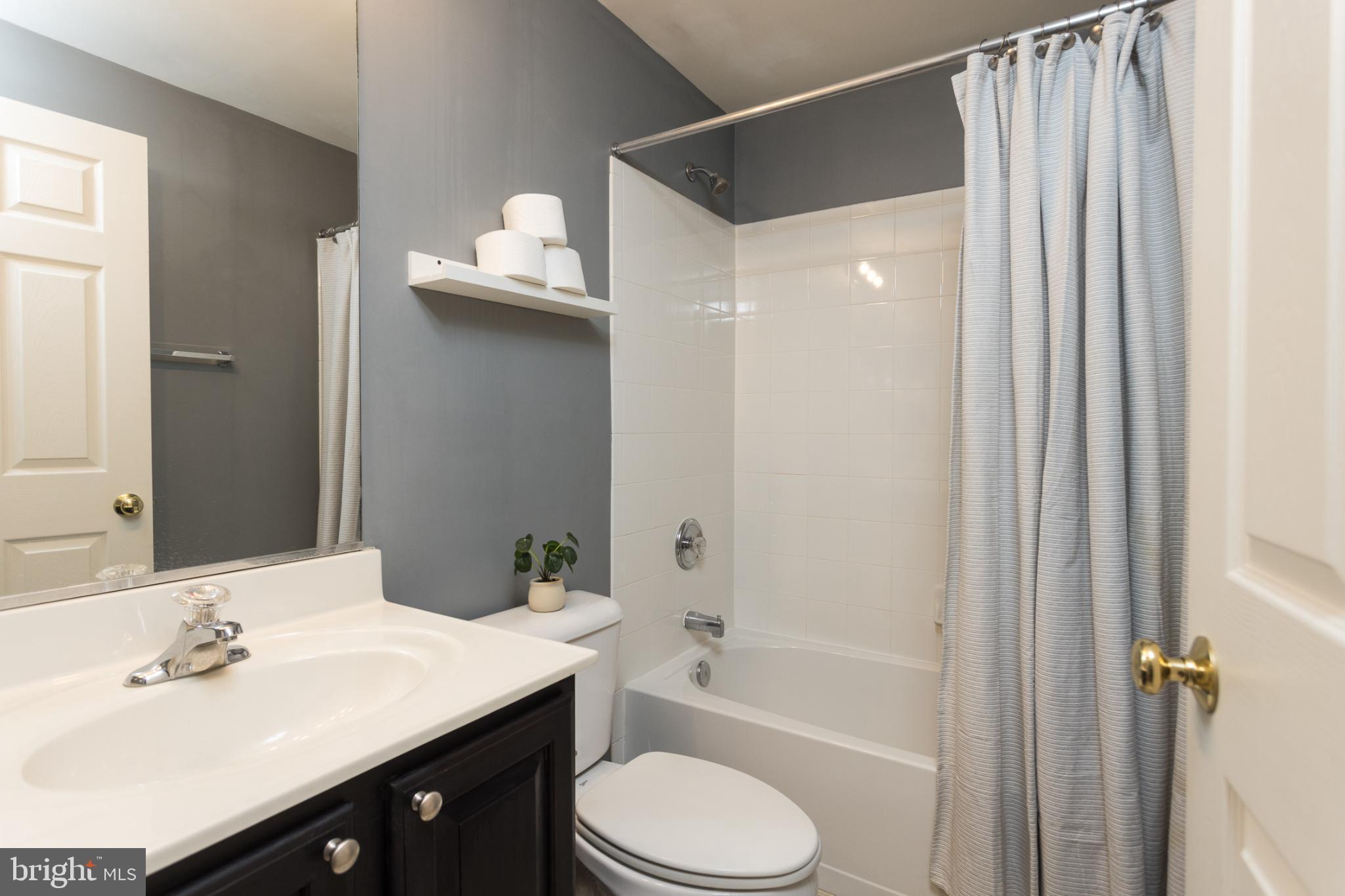 3013 Raking Leaf Drive Abingdon, MD 21009 - Photo 24 of 29 a bathroom with a sink toilet and shower