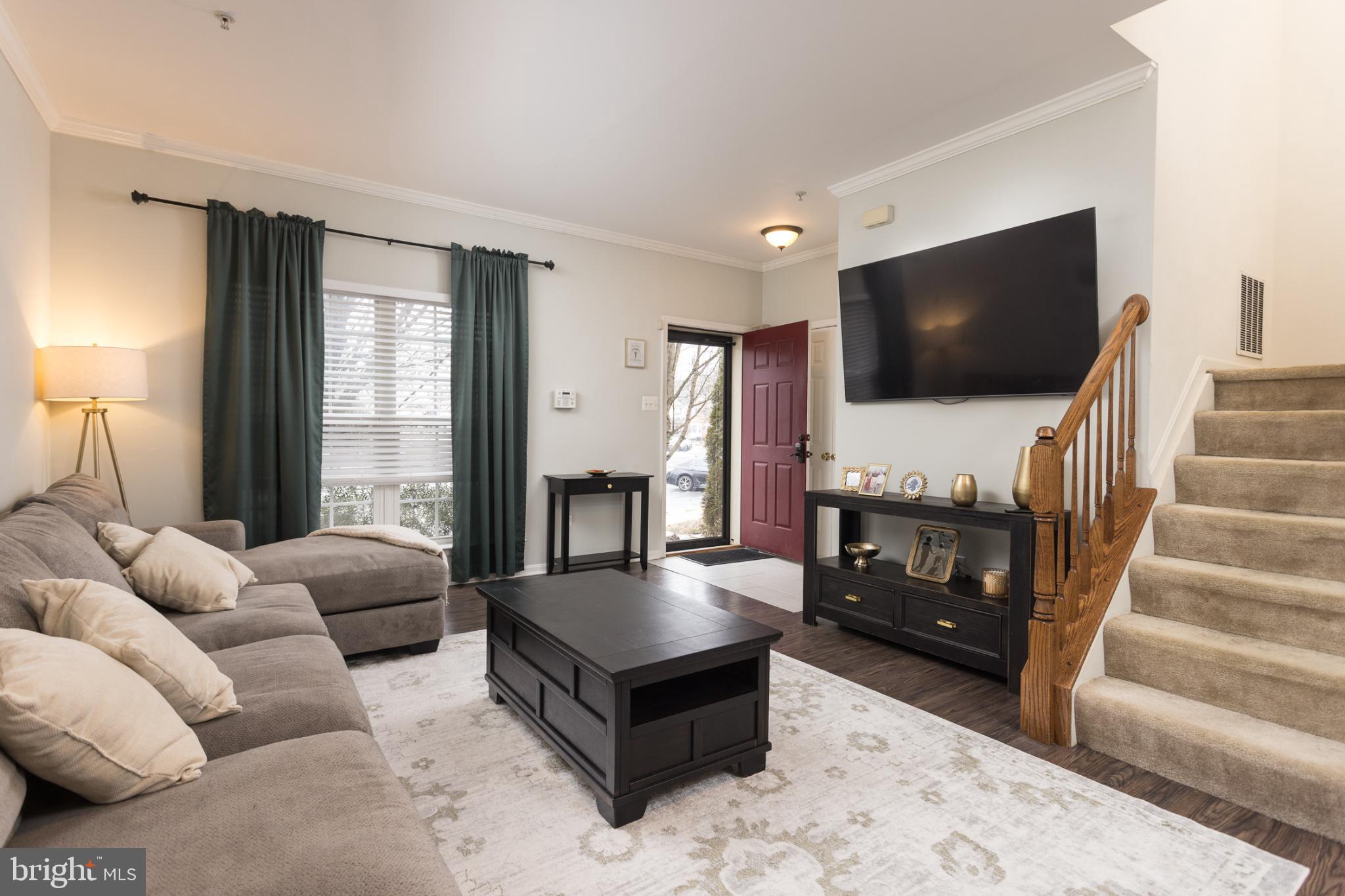 3013 Raking Leaf Drive Abingdon, MD 21009 - Photo 3 of 29 a living room with furniture and a flat screen tv