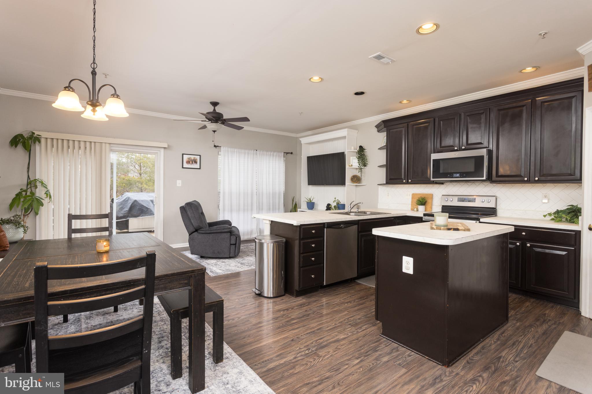 3013 Raking Leaf Drive Abingdon, MD 21009 - Photo 4 of 29 a kitchen with a sink stove and refrigerator