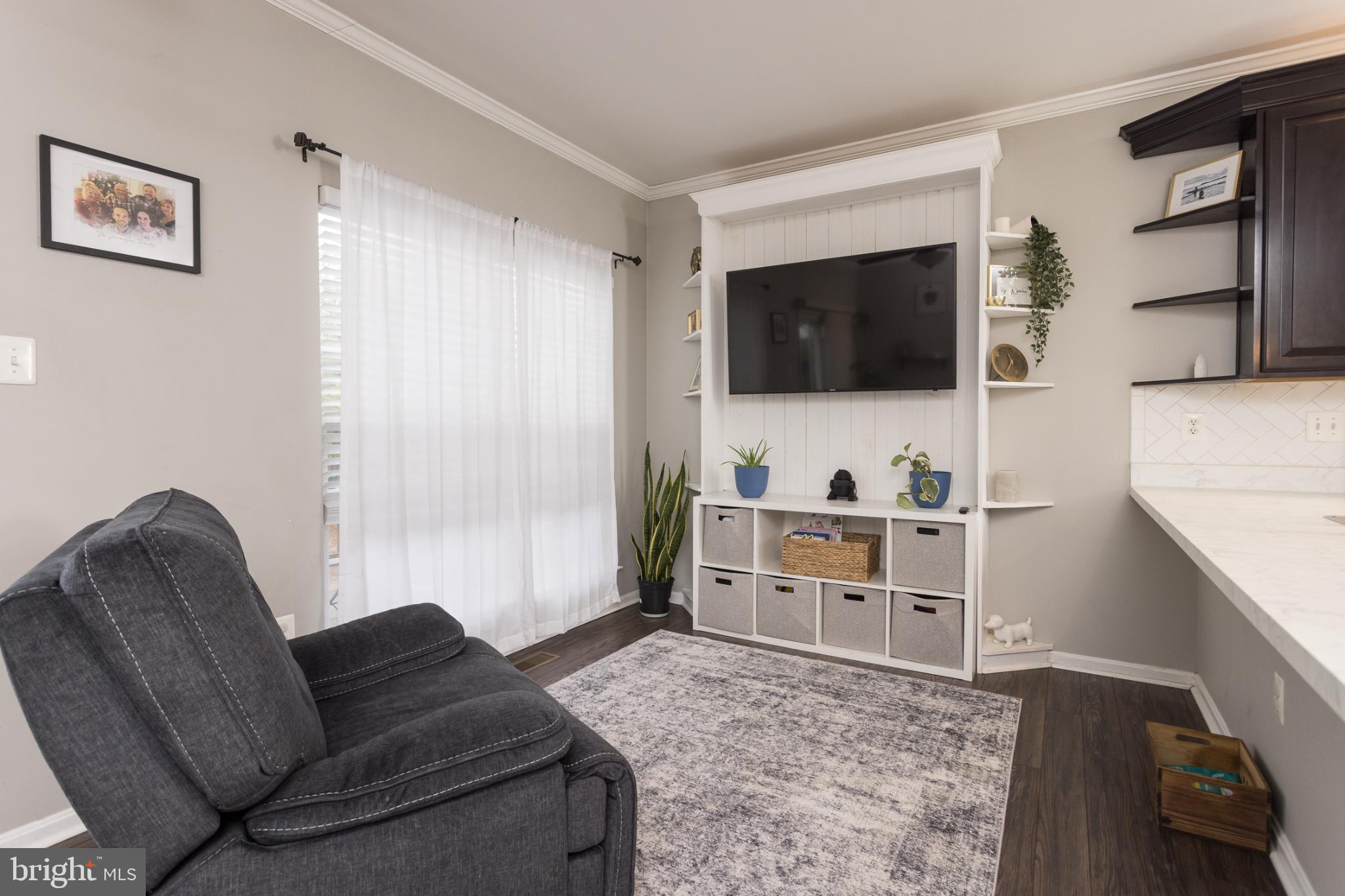 3013 Raking Leaf Drive Abingdon, MD 21009 - Photo 9 of 29 a living room with furniture and a flat screen tv