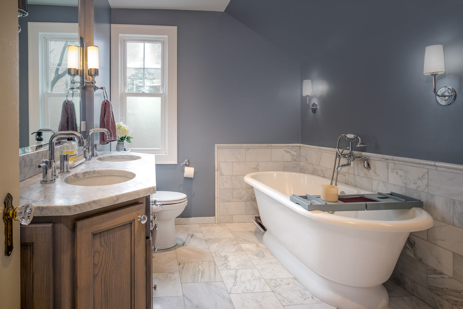 728 Howard Street Wheaton, IL 60187 - Photo 13 of 46 a bathroom with a granite countertop sink a toilet a mirror and vanity