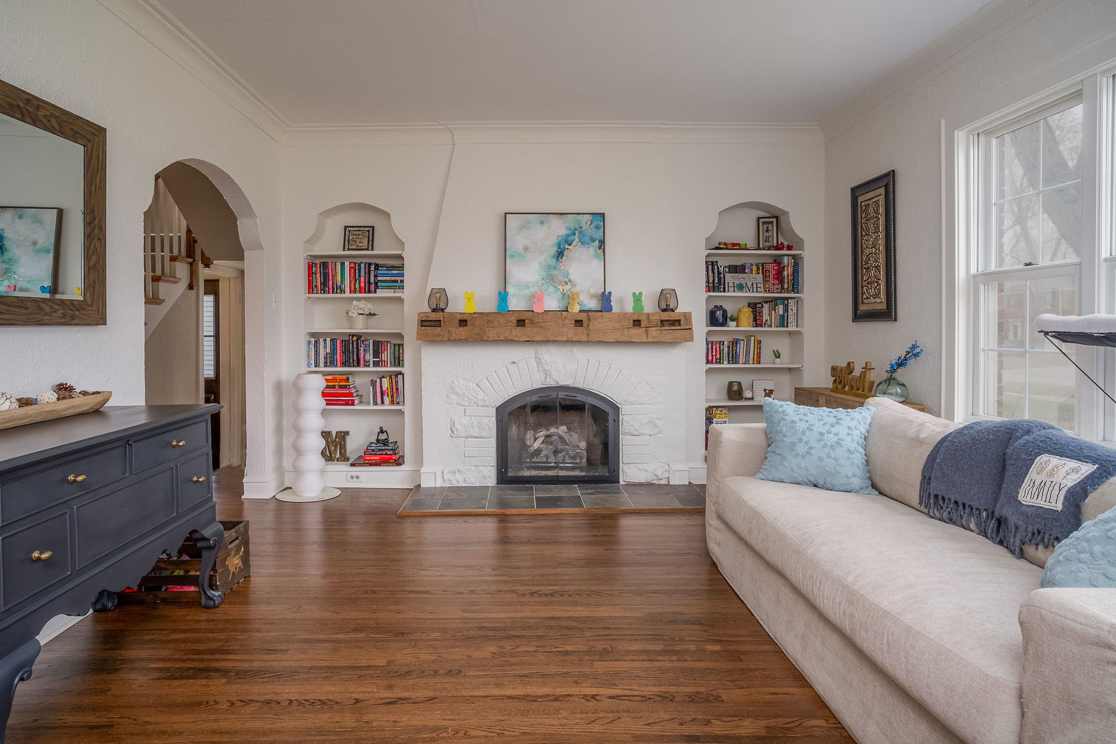 728 Howard Street Wheaton, IL 60187 - Photo 17 of 46 a living room with furniture and a fireplace