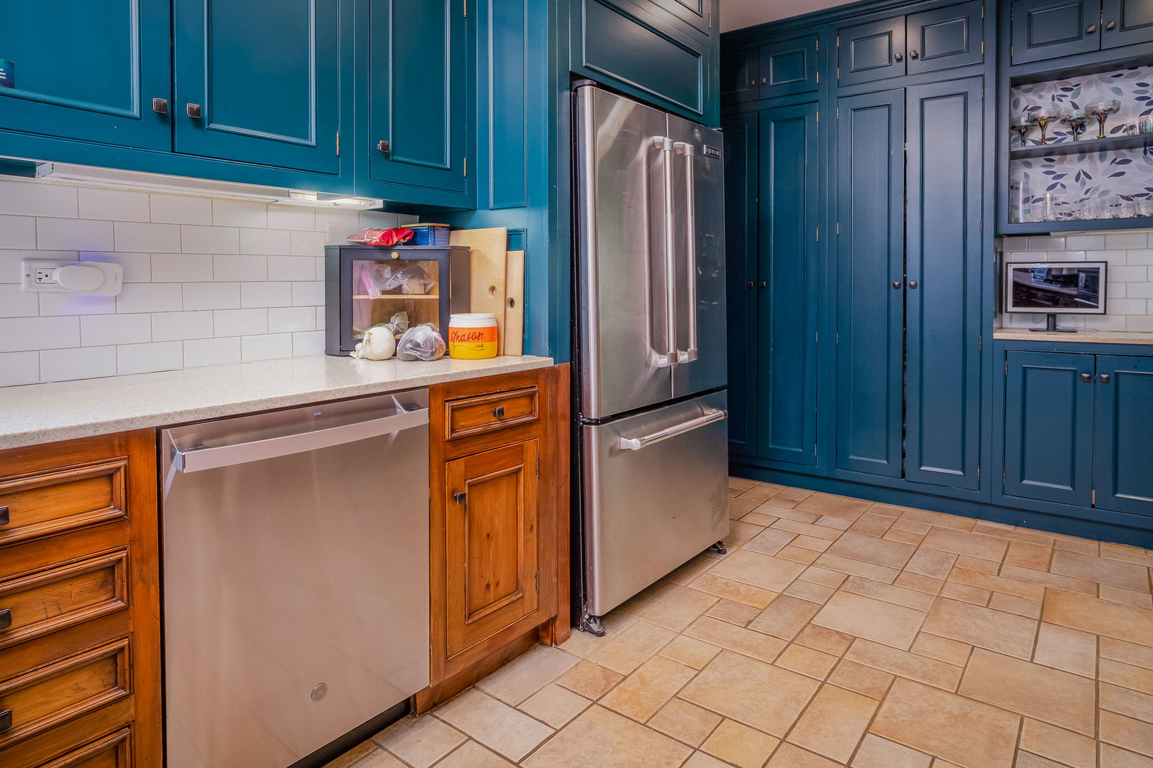 728 Howard Street Wheaton, IL 60187 - Photo 7 of 46 a kitchen with stainless steel appliances a refrigerator and cabinets