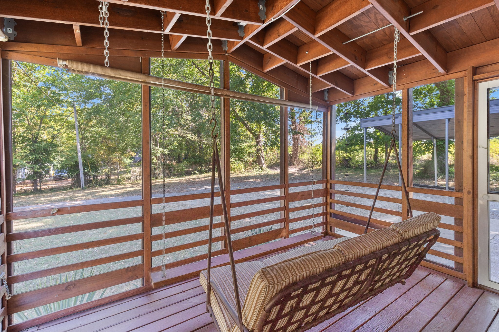 2306 Wayne Road Bon Aqua, TN 37025 - Photo 6 of 41 a view of a roof deck with wooden floor and outdoor space