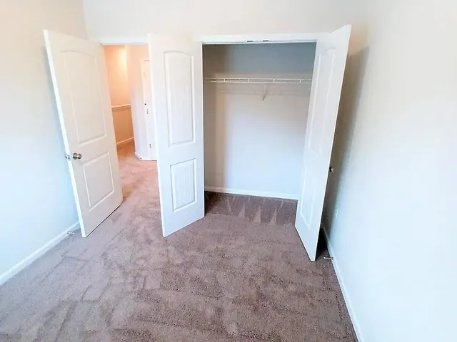 a view of a room that has a window in it