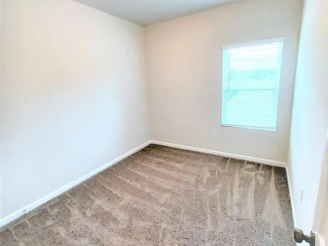 an empty room with a window