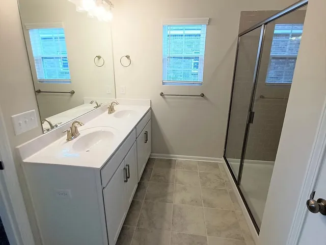 a black and white building with black door