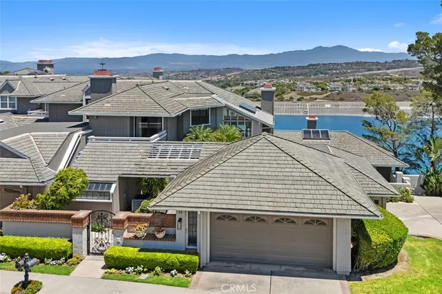 a aerial view of a house with a yard