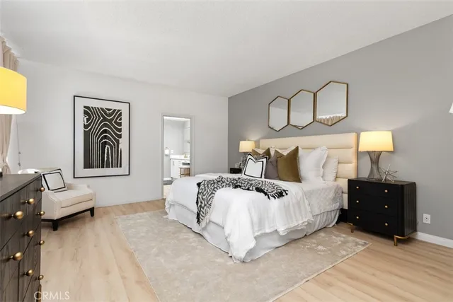 a bedroom with bed and window