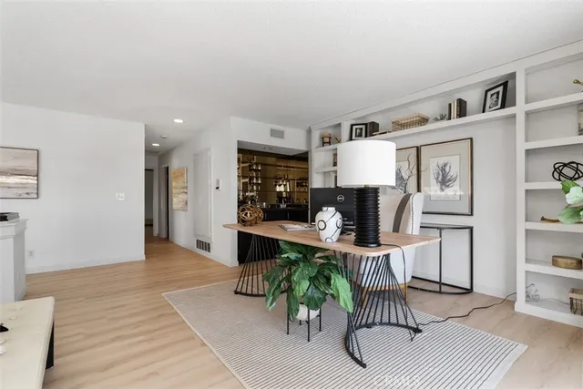 a view of a lake with a city