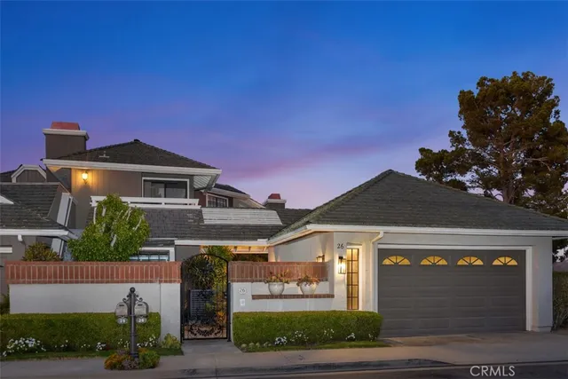 an aerial view of residential building with outdoor space and lake view