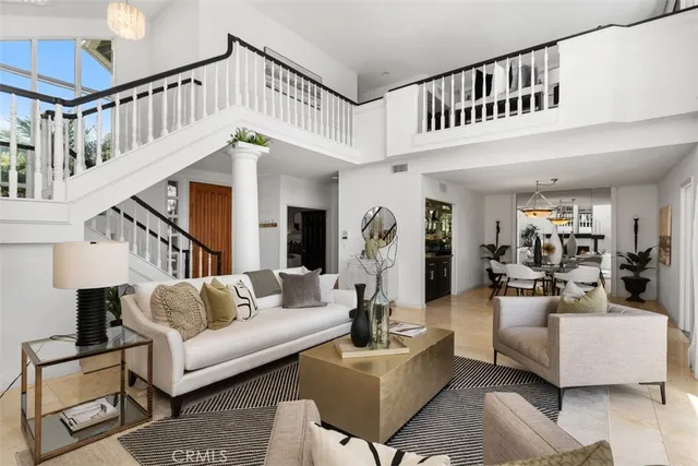 a living room with furniture or stairs and a couch