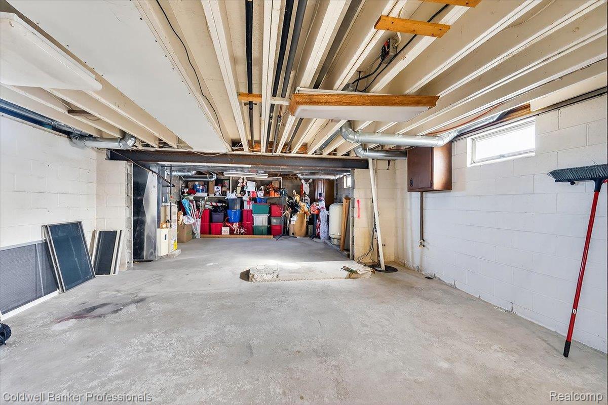 7410 Wilson Road Montrose, MI 48457 - Photo 31 of 38 Basement with heating unit