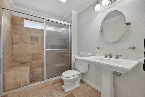 a view of an empty room with a ceiling fan