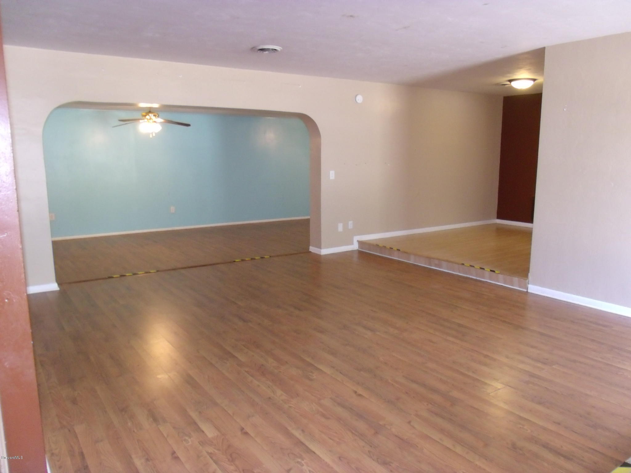 109 St George Road West Melbourne, FL 32904 - Photo 12 of 18 Family room/Dining room/Bonus room
