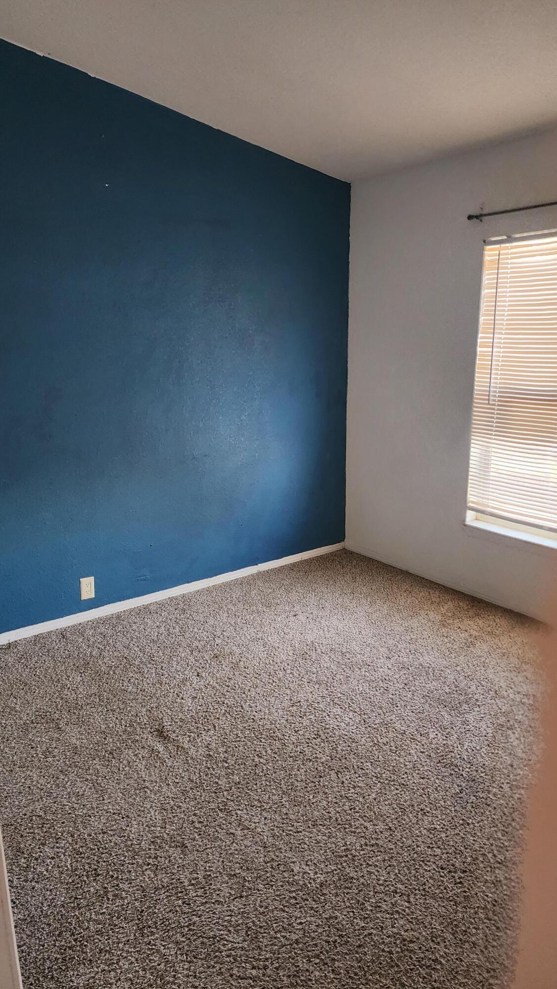 3641 Dawn Road Rosamond, CA 93560 - Photo 13 of 33 an empty room with windows