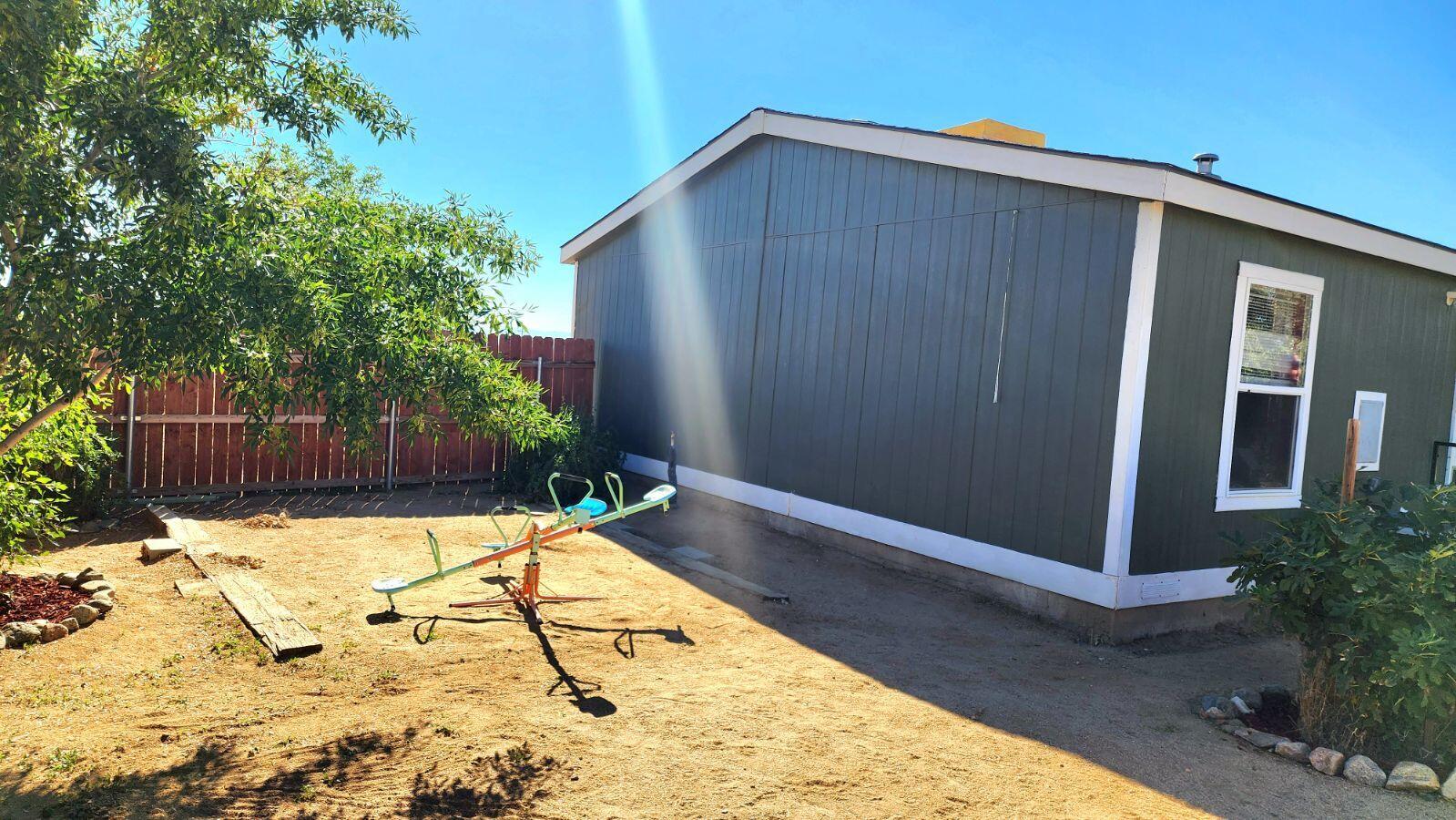3641 Dawn Road Rosamond, CA 93560 - Photo 19 of 33 a view of swimming pool with a patio