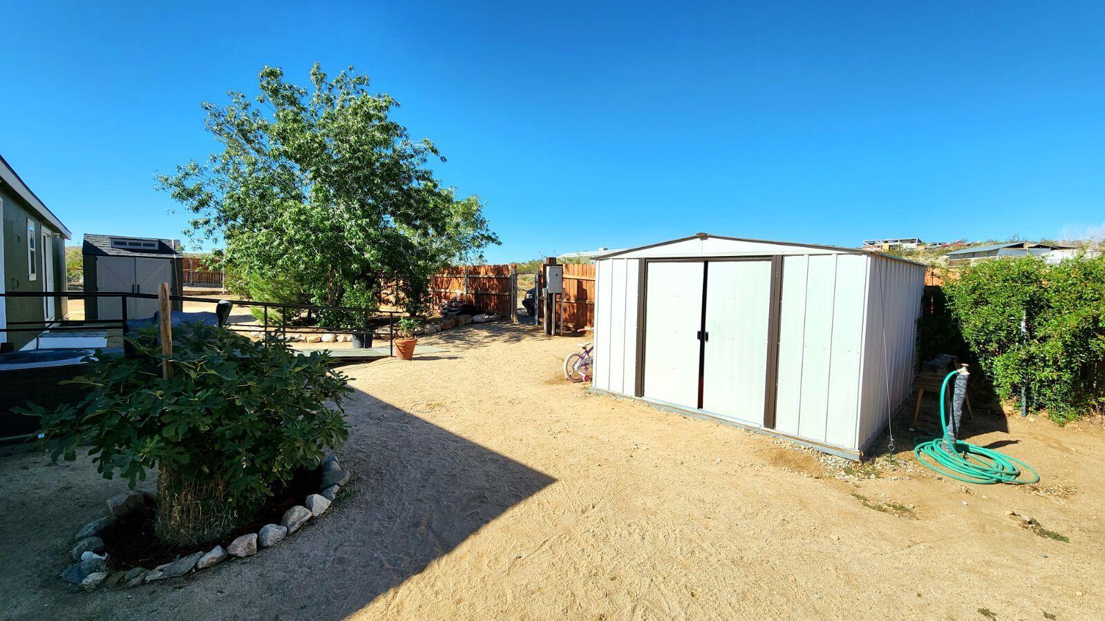 3641 Dawn Road Rosamond, CA 93560 - Photo 21 of 33 a view of swimming pool with a patio