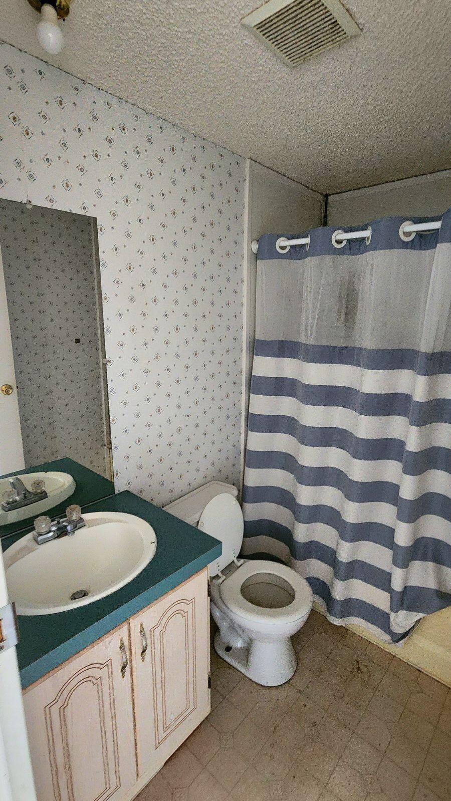3641 Dawn Road Rosamond, CA 93560 - Photo 24 of 33 a bathroom with a sink and a toilet