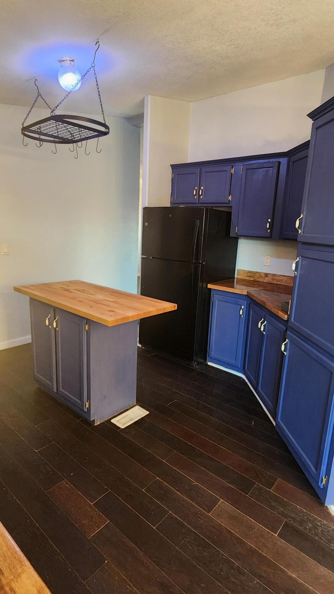 3641 Dawn Road Rosamond, CA 93560 - Photo 6 of 33 a view of a room with wooden floor