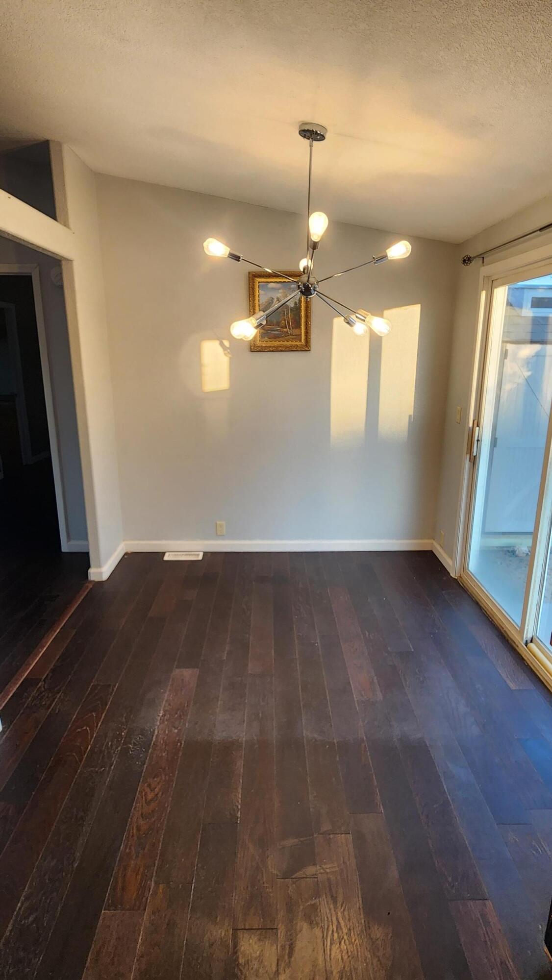3641 Dawn Road Rosamond, CA 93560 - Photo 9 of 33 a view of empty room with wooden floor