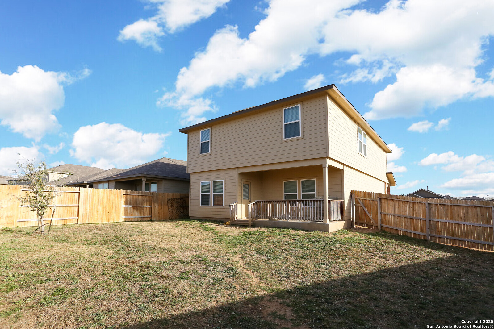 132 Bunkers Hl Road Floresville, TX 78114 - Photo 26 of 27 a front view of a house with garden