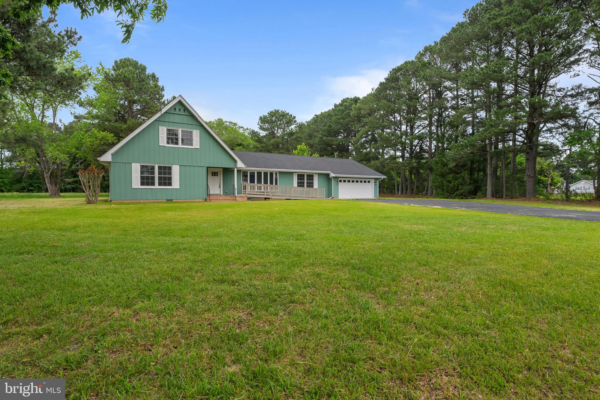 a view of big house with a big yard