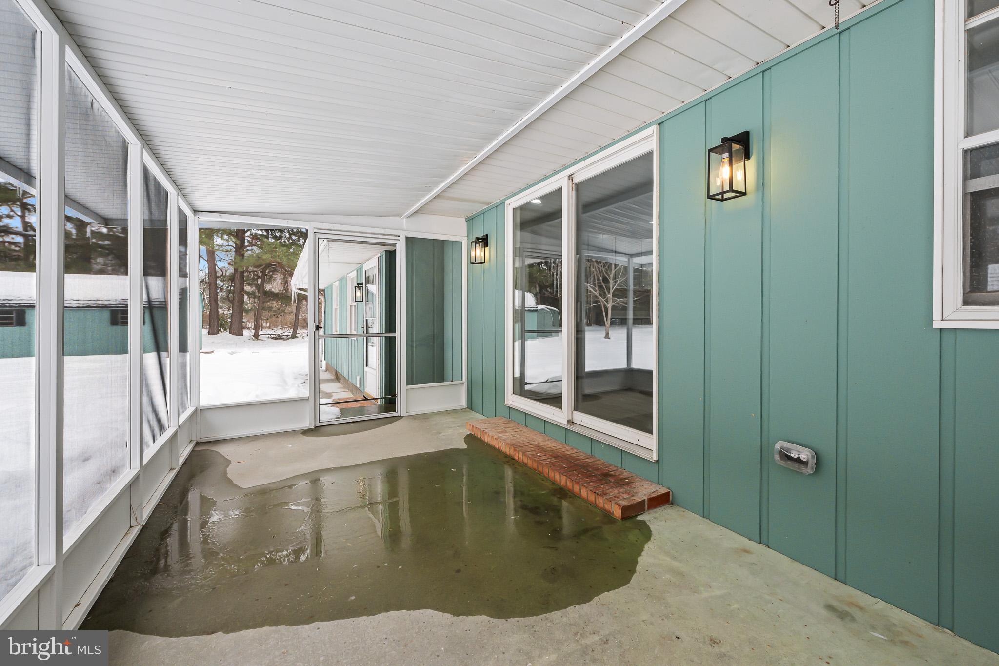 21830 Vaughn Road Georgetown, DE 19947 - Photo 21 of 39 a view of a entryway door