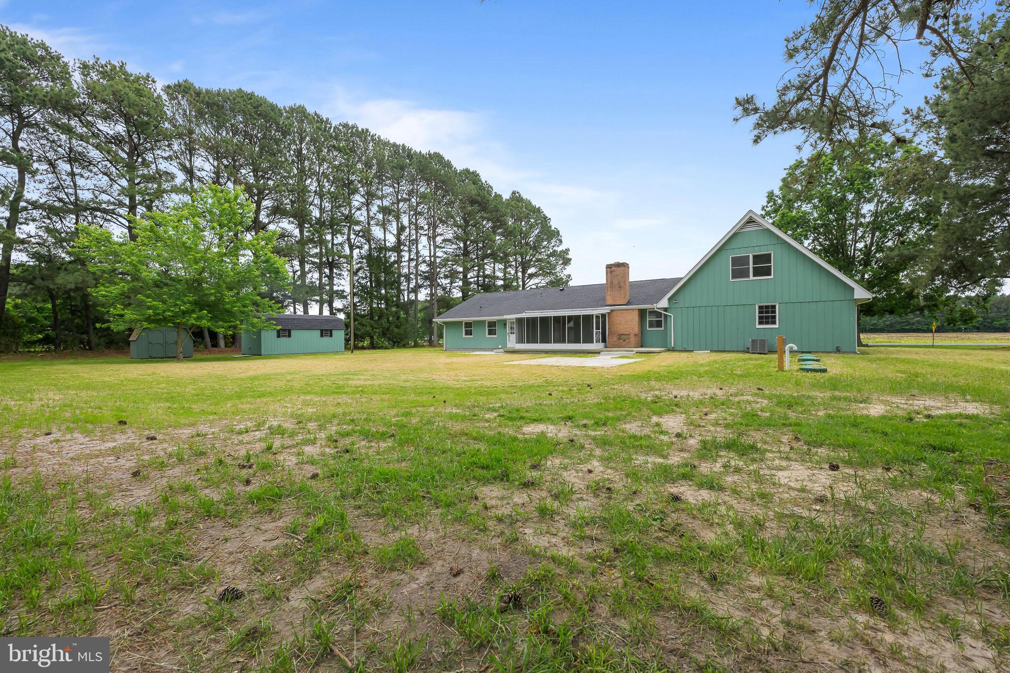 21830 Vaughn Road Georgetown, DE 19947 - Photo 38 of 39 a house with garden in front of it