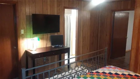 a view of a swimming pool with an outdoor space