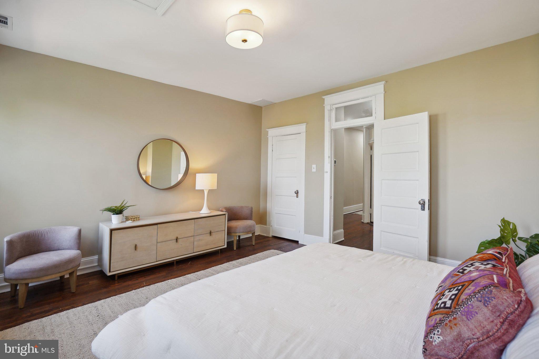 645 5th Street Northeast Washington, DC 20002 - Photo 12 of 33 Primary bedroom and lovely door transoms