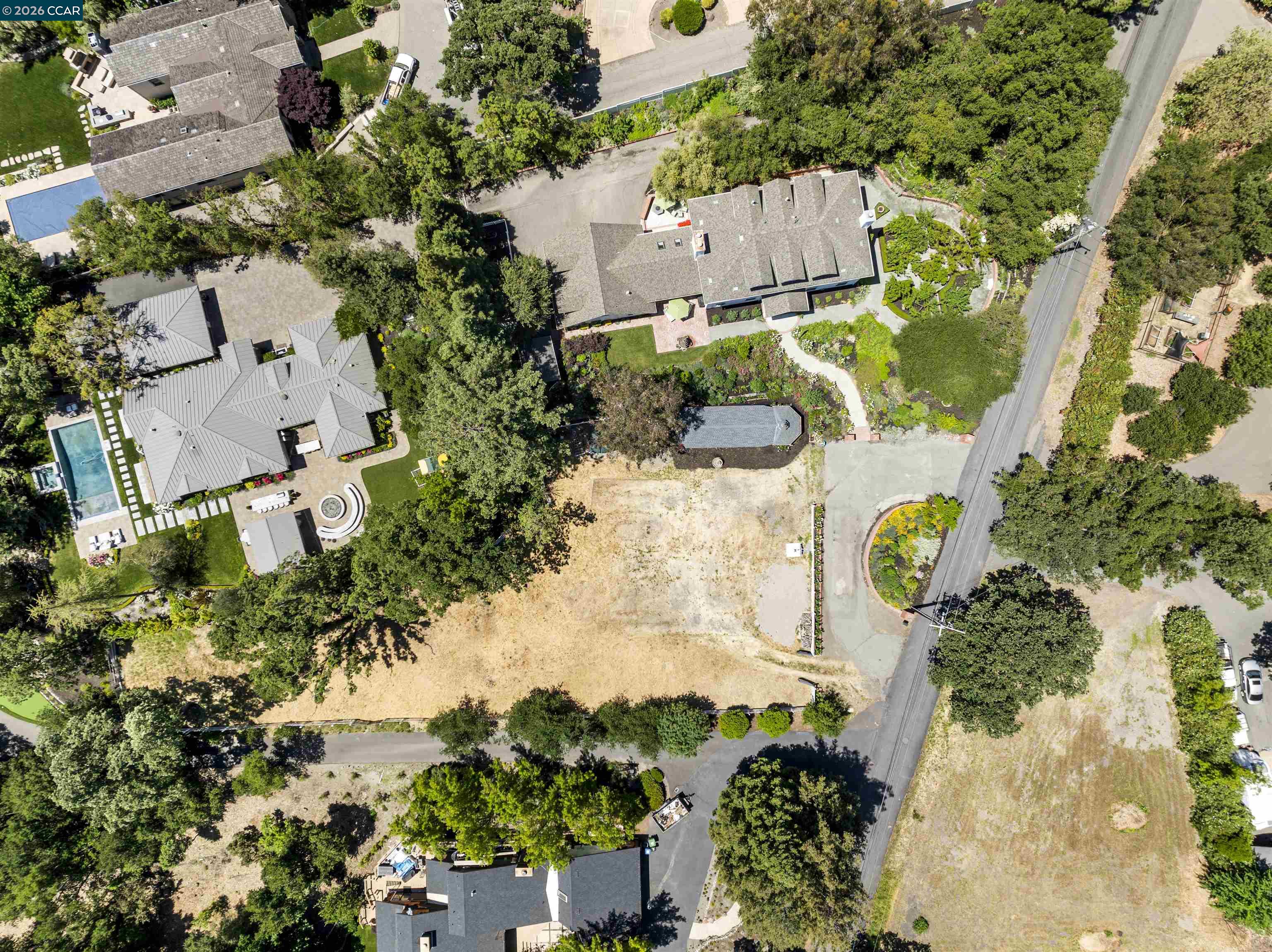 177 Oak Road Alamo, CA 94507 - Photo 49 of 85 an aerial view of residential house with yard and swimming pool