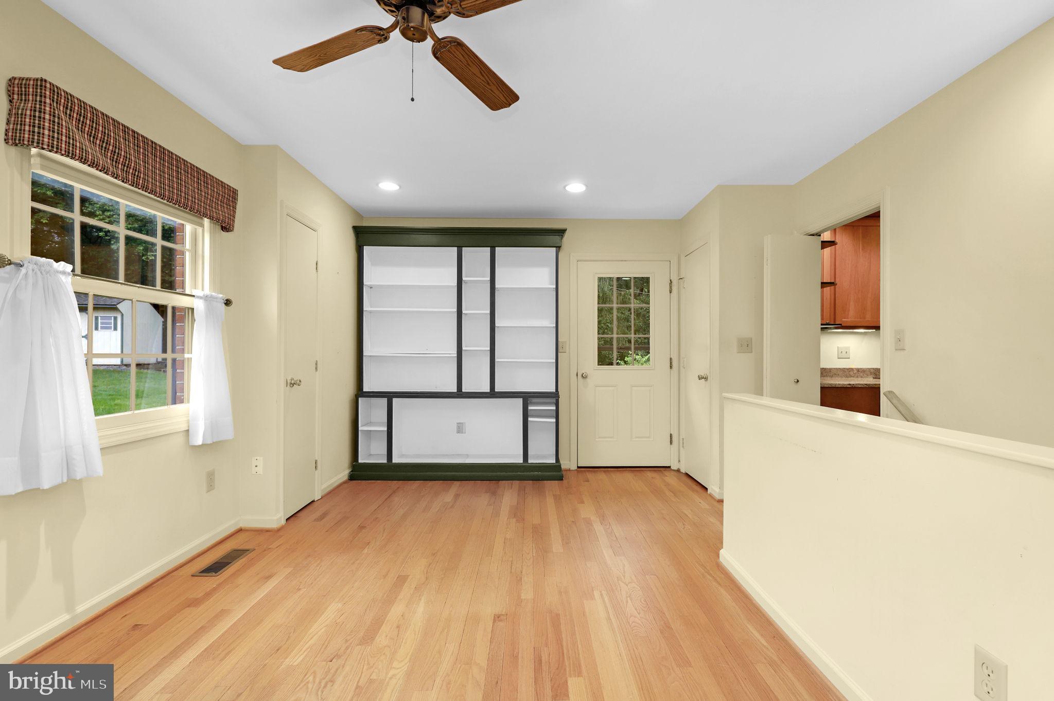 110 Linden Boulevard Middletown, MD 21769 - Photo 16 of 38 a spacious bedroom with a large bed and a large window