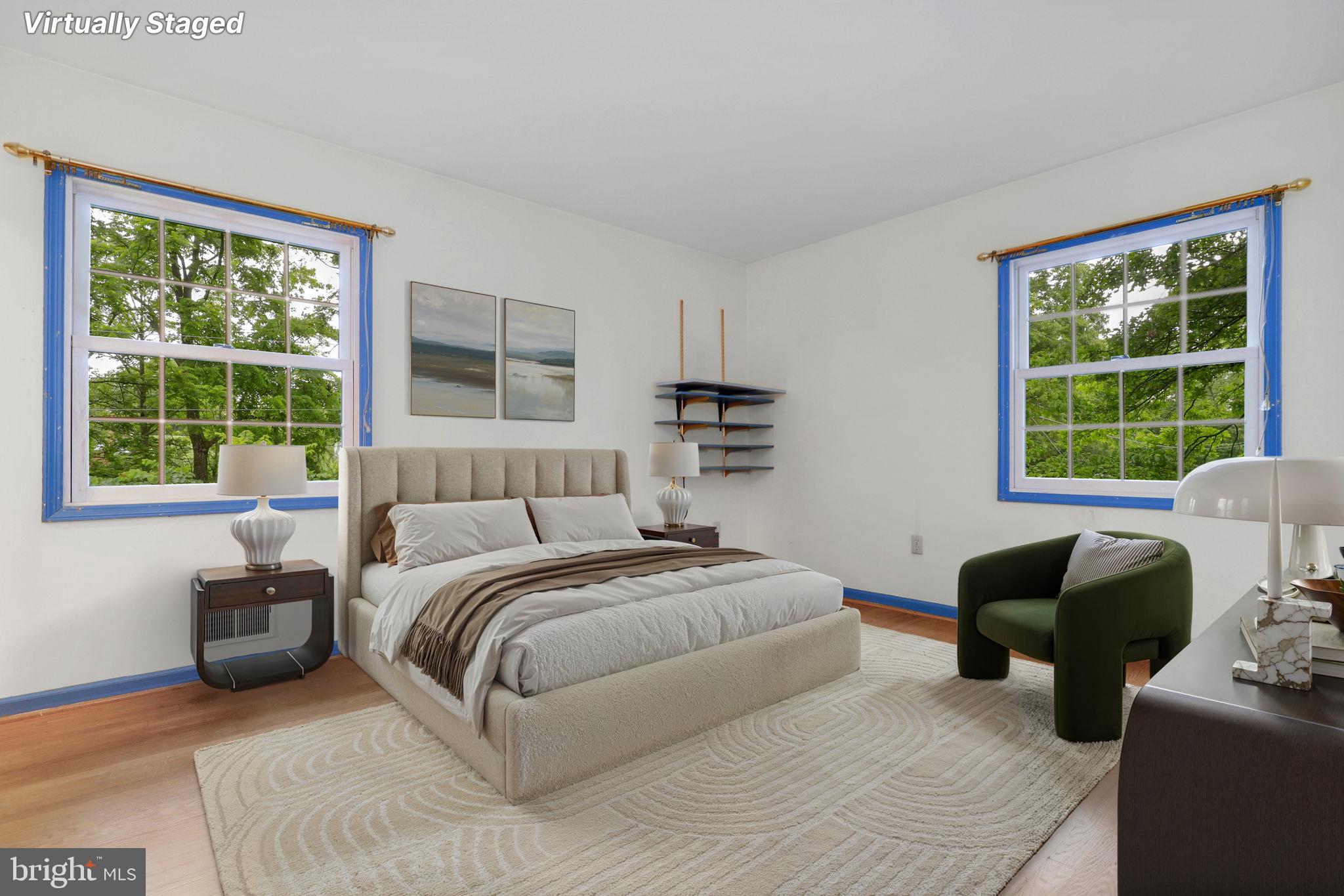 110 Linden Boulevard Middletown, MD 21769 - Photo 17 of 38 a bedroom with a bed couch and a large window