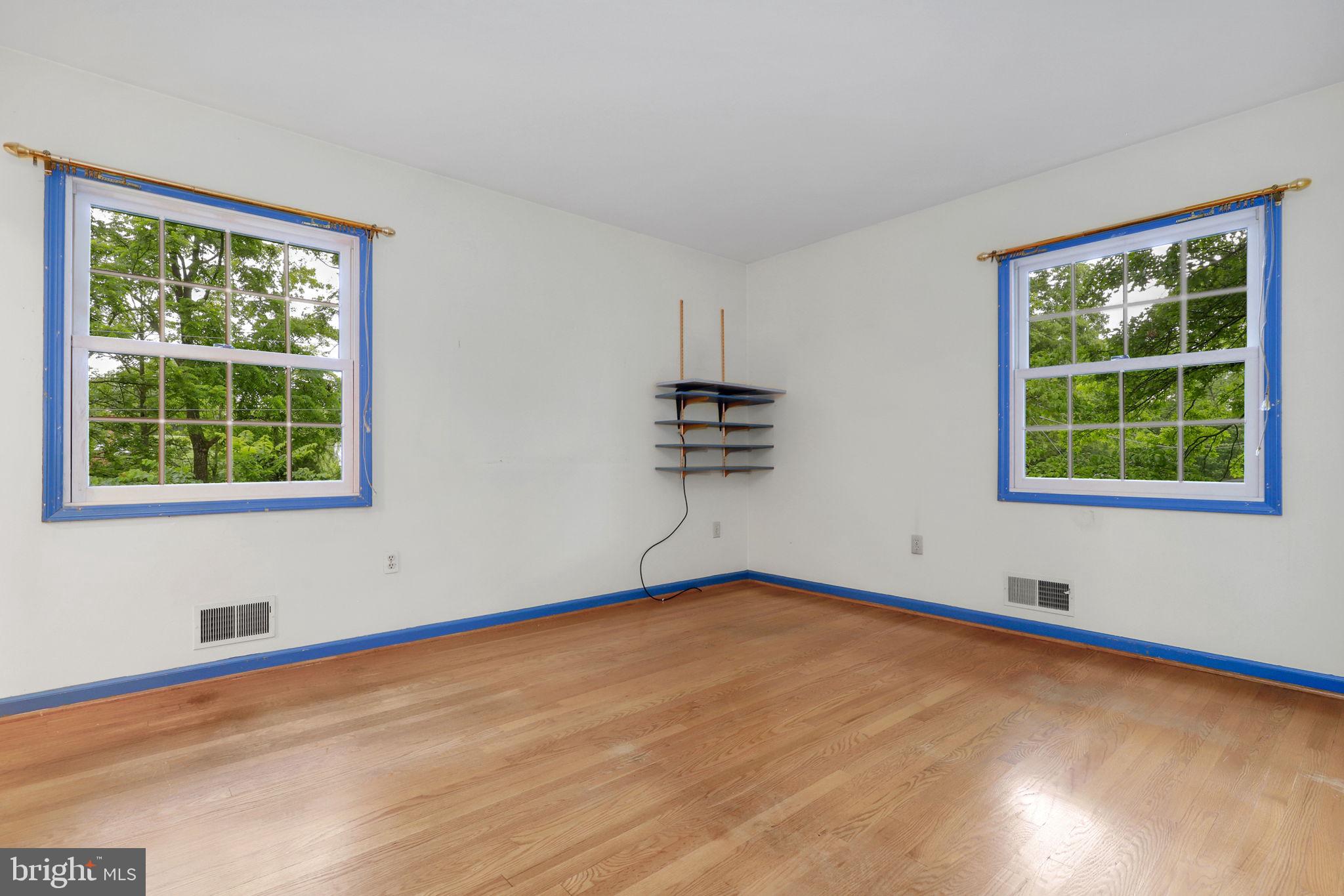 110 Linden Boulevard Middletown, MD 21769 - Photo 18 of 38 wooden floor in an empty room with a window