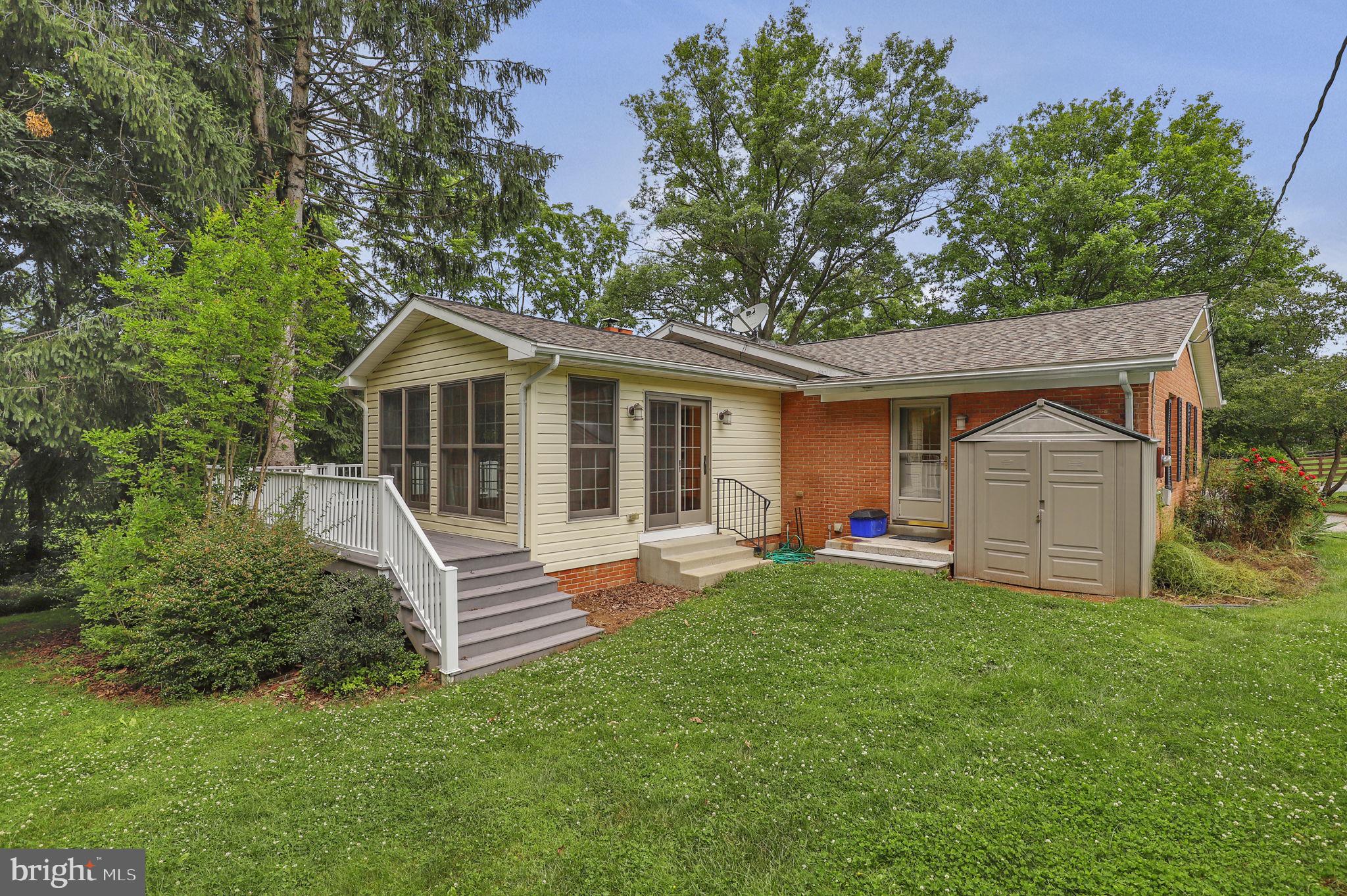 110 Linden Boulevard Middletown, MD 21769 - Photo 28 of 38 a front view of a house with a yard and trees