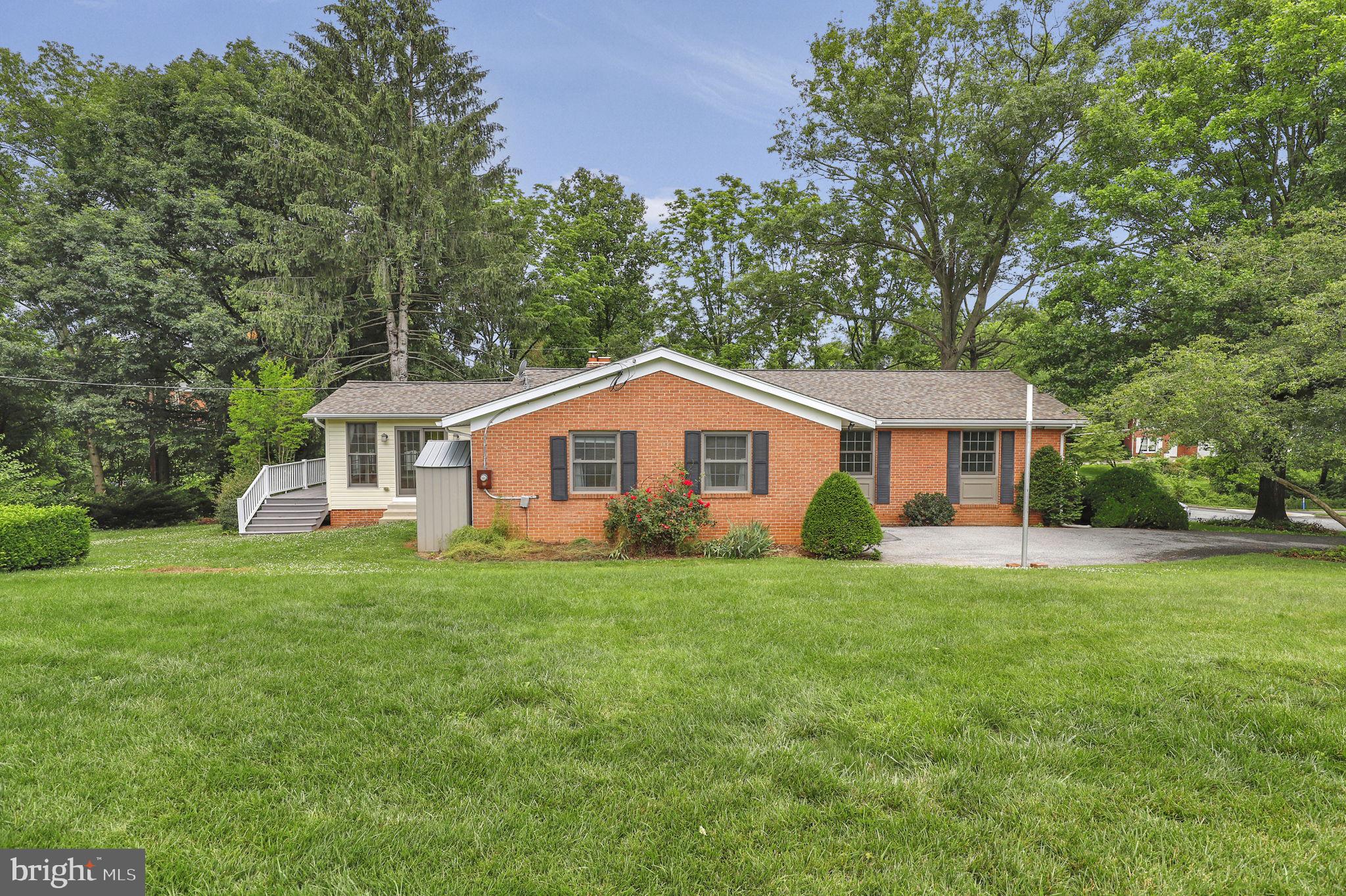 110 Linden Boulevard Middletown, MD 21769 - Photo 30 of 38 a front view of a house with a yard